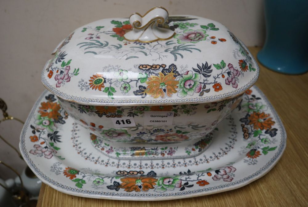 A Davenport stone china soup tureen and cover and a meat platter, printed and painted with chinoiserie flowers